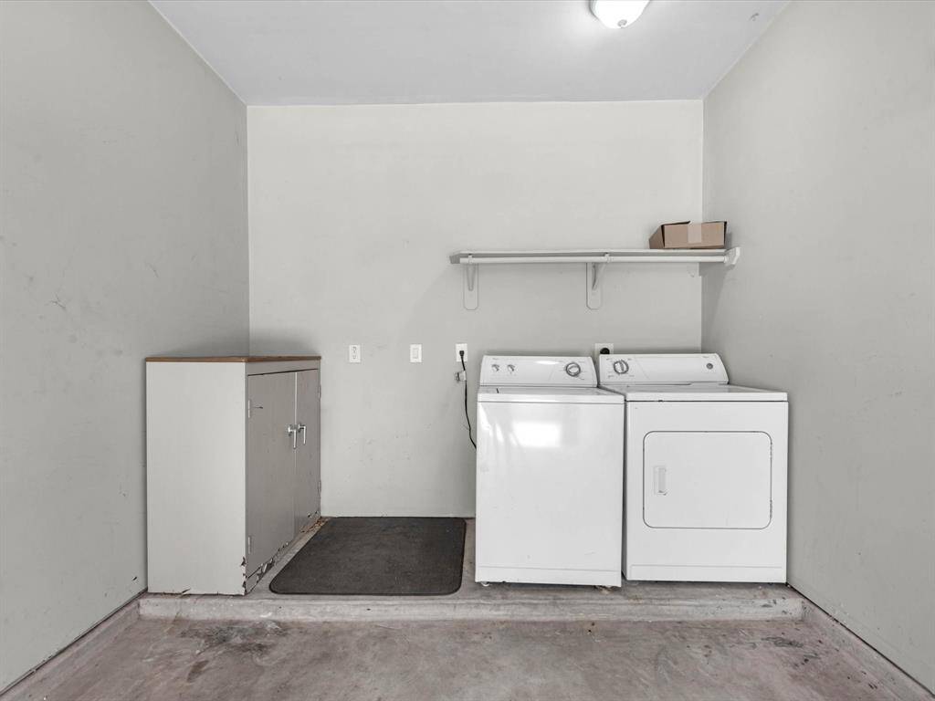 The washer and dryer are located in the one car garage, and are included with the sale of the property!