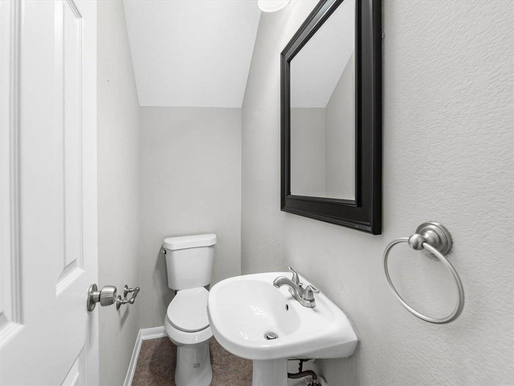 A half bathroom is conveniently located downstairs.