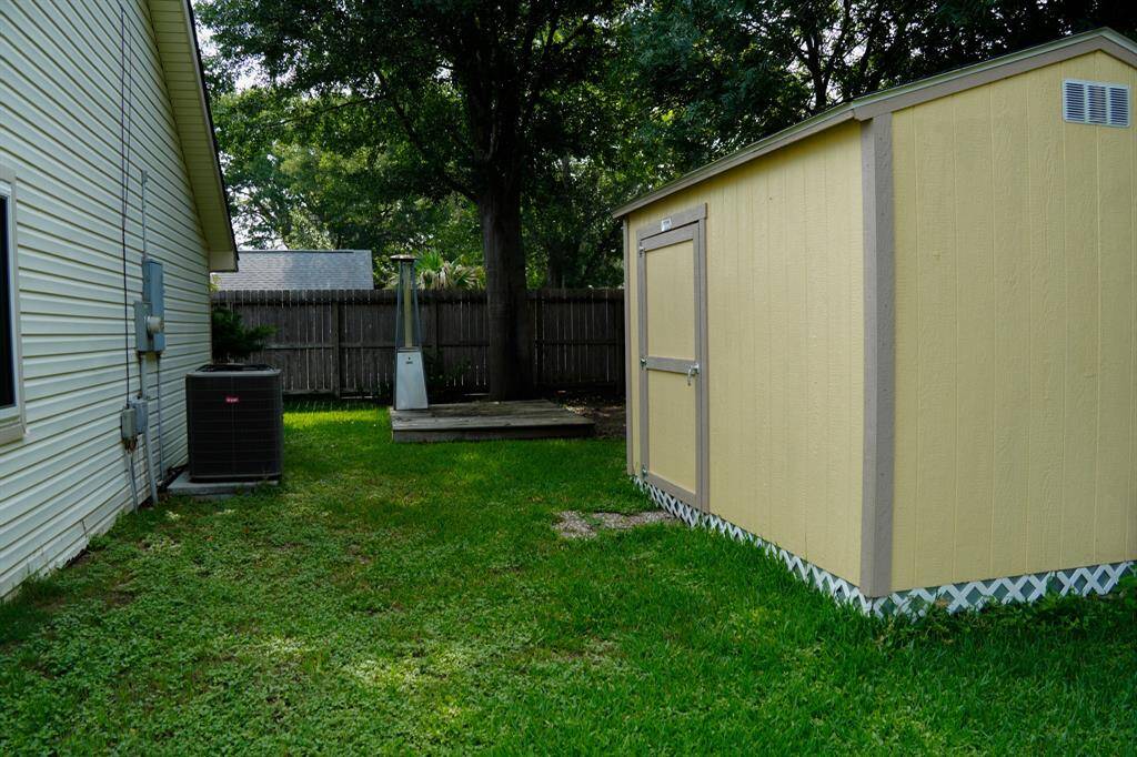 Covered patio in side yard off the dining area.