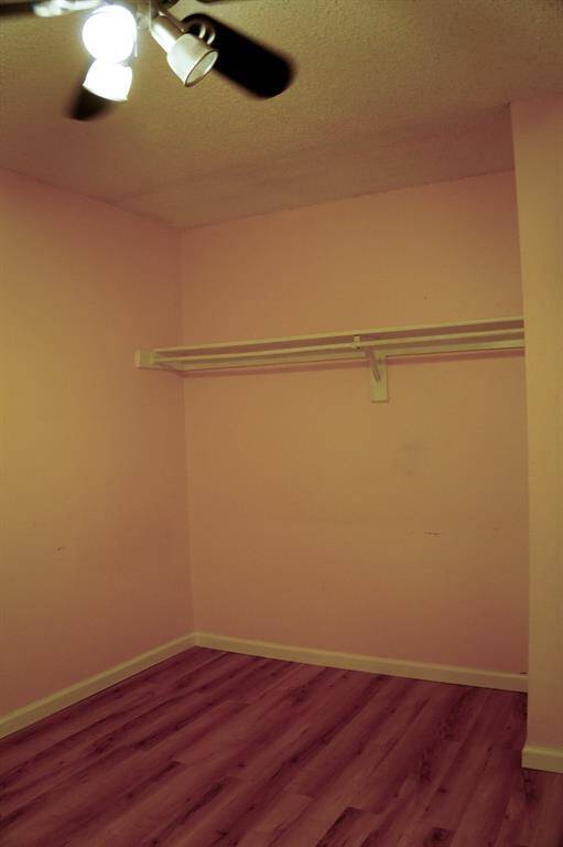 Secondary Bedroom 1 with open closet