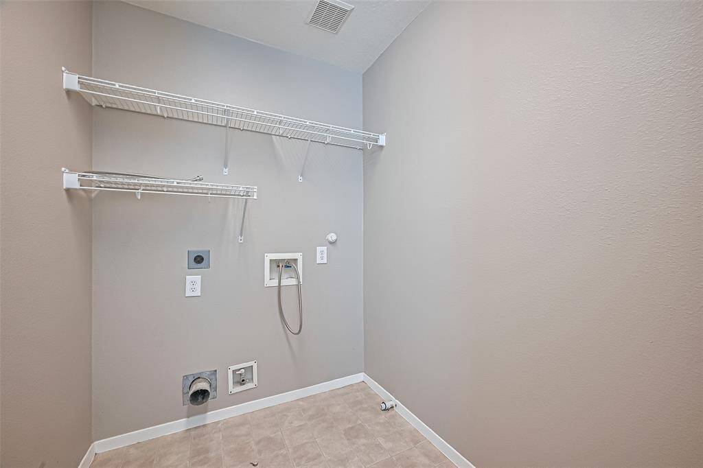 Walk in utility room.