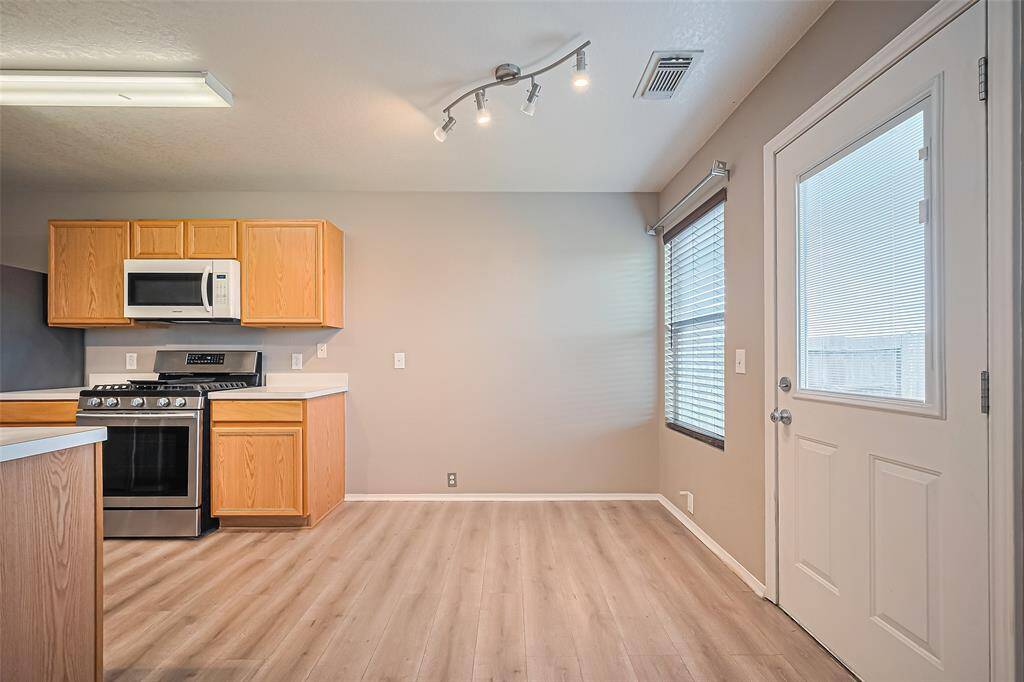 Breakfast area. Right door leads to the backyard.