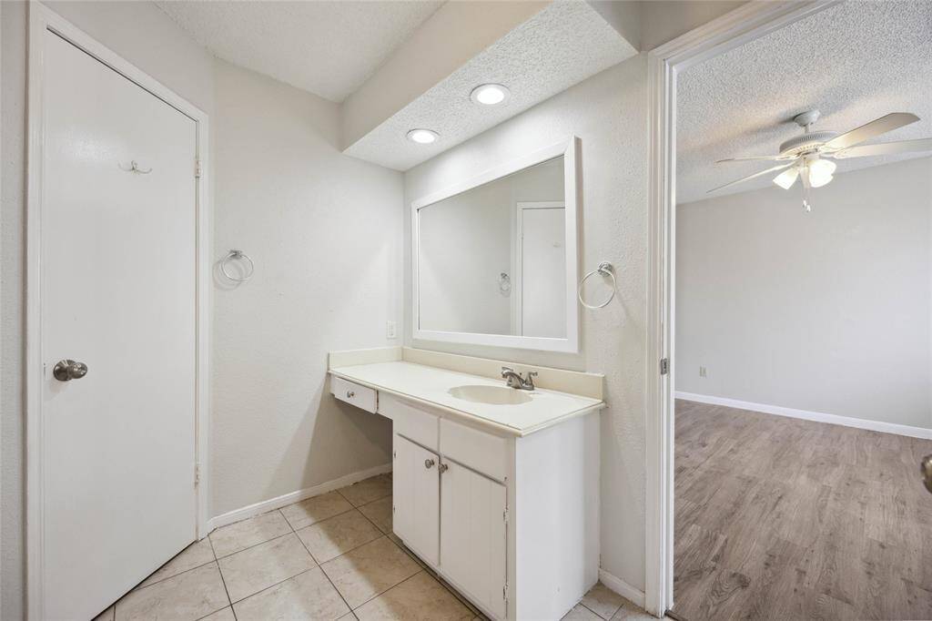 Elegant master bathroom vanity with ample counter space.