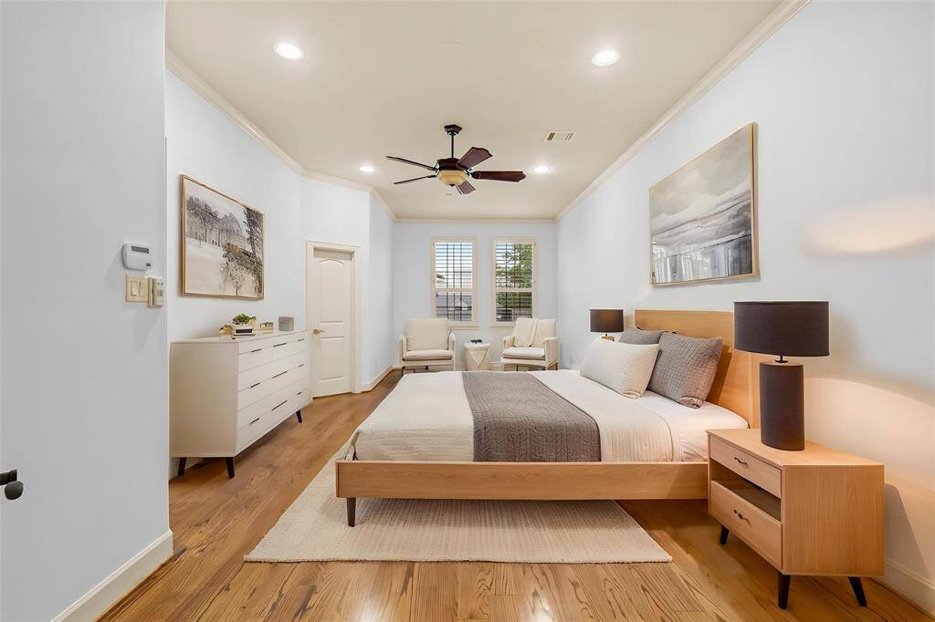 Primary suite has two walk-in closets and ample  room for a sitting area