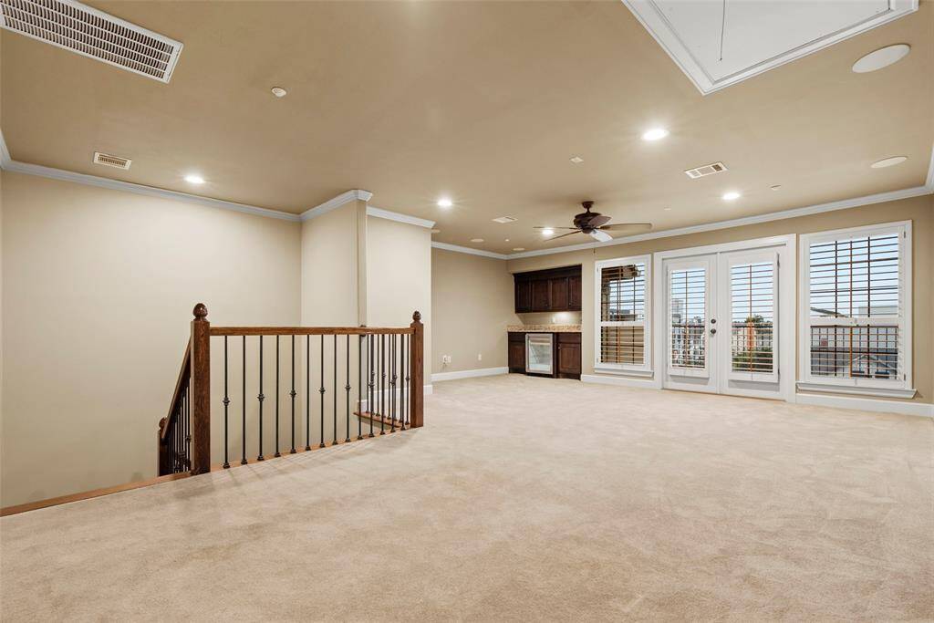 Fourth floor game room or family room leads to outdoor  terrace