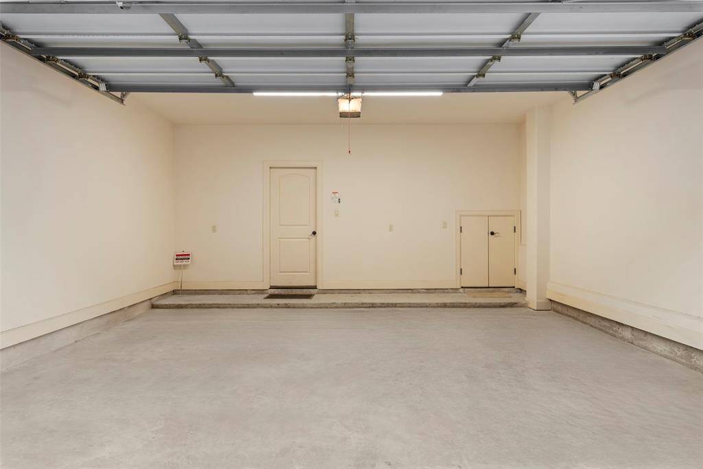 Two car garage with entry to foyer