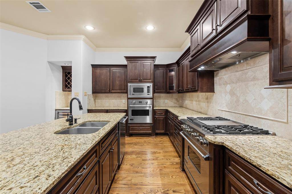 Granite counter tops and storage galore make for entertaining with ease