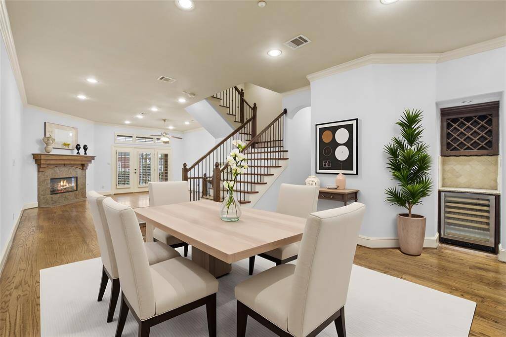 Dining room next to kitchen and mini bar perfect for entertaining