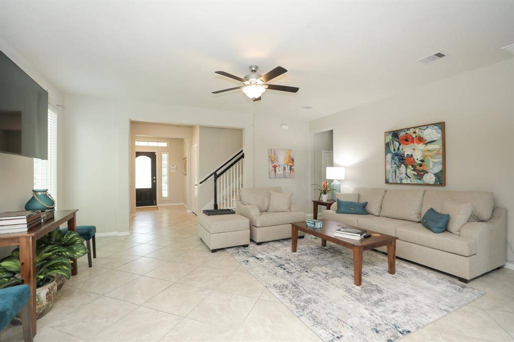 Notice this great flow. Just before the staircase and down the hallway is the laundry room.