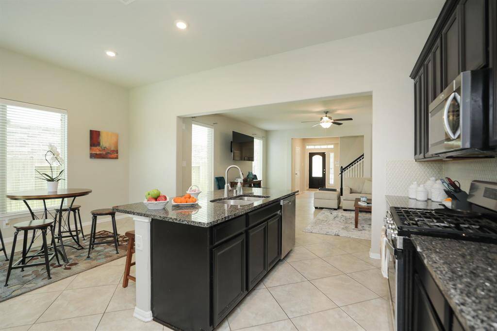 The flow between the kitchen, dining and family room makes this great entertaining space.