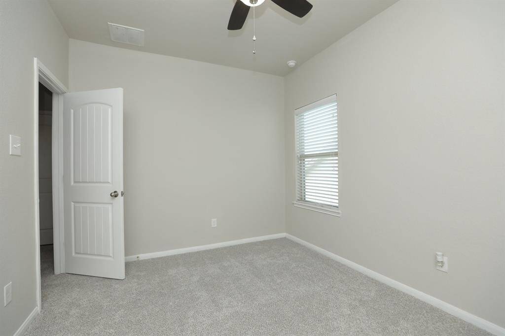 The bedroom has easy access to the game/media/office space.