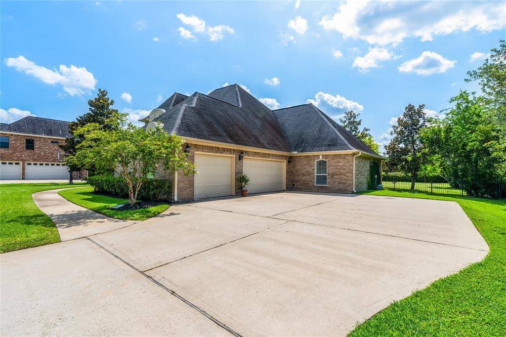3-CAR GARAGE WITH OVERSIZED DRIVEWAY—PLENTY OF SPACE FOR GUEST PARKING.