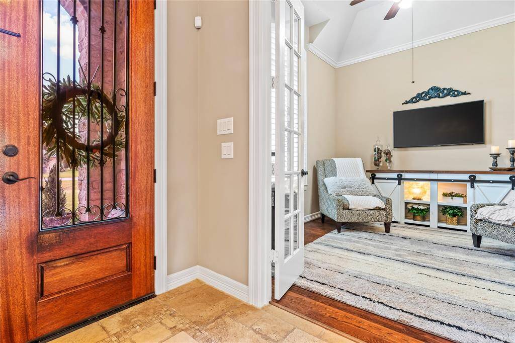 STUDY OFFERS FRENCH DOOR ACCESS—PERFECT FOR A HOME OFFICE, READING NOOK, OR HOBBY ROOM.