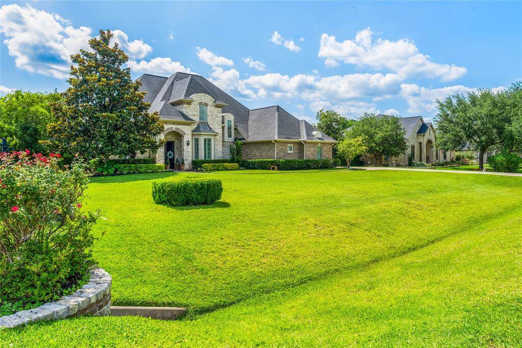 OVERSIZED LOT LOCATED IN A PREMIER COMMUNITY WITH TREE-LINED STREETS.