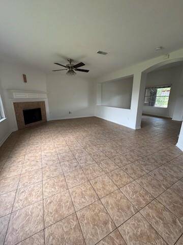 Open Living Room with Cozy Fireplace!
