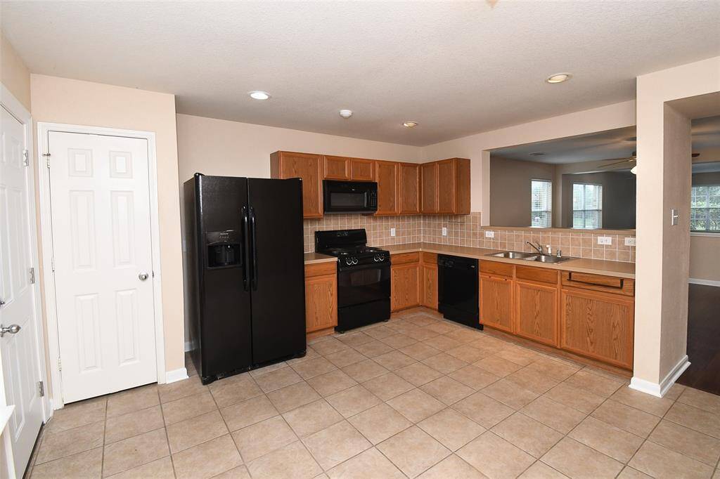 Roomy pantry is behind door on the left.