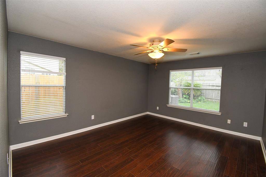 Spacious Master faces the side gate and back yard.