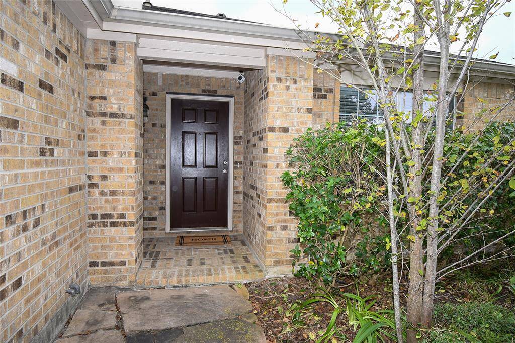 Brick paver porch is so welcoming for visiting family and friends.