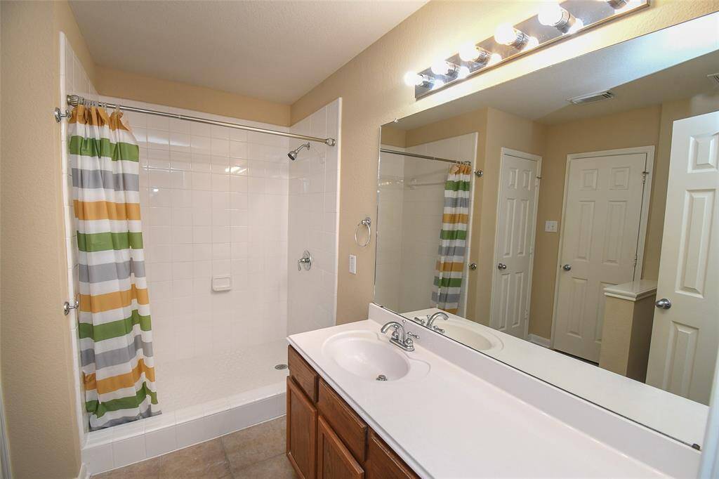 Extra long vanity adds a spa-like quality.