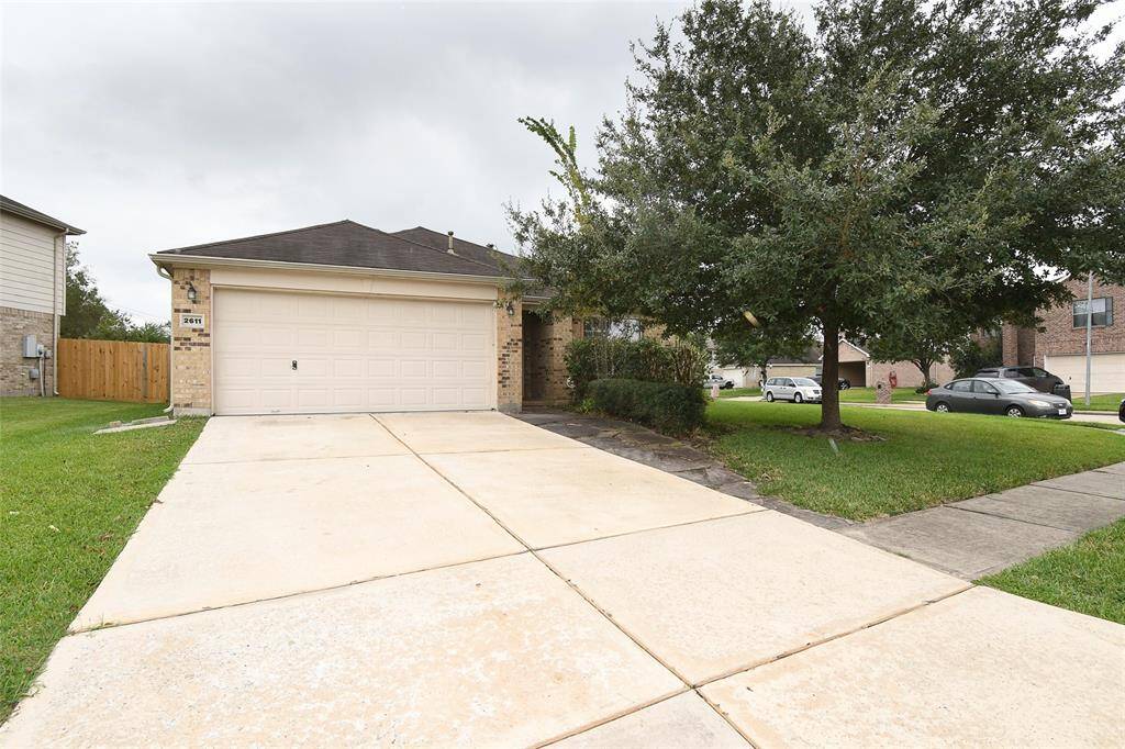 Double-wide driveway offers ample parking for you and your guests.