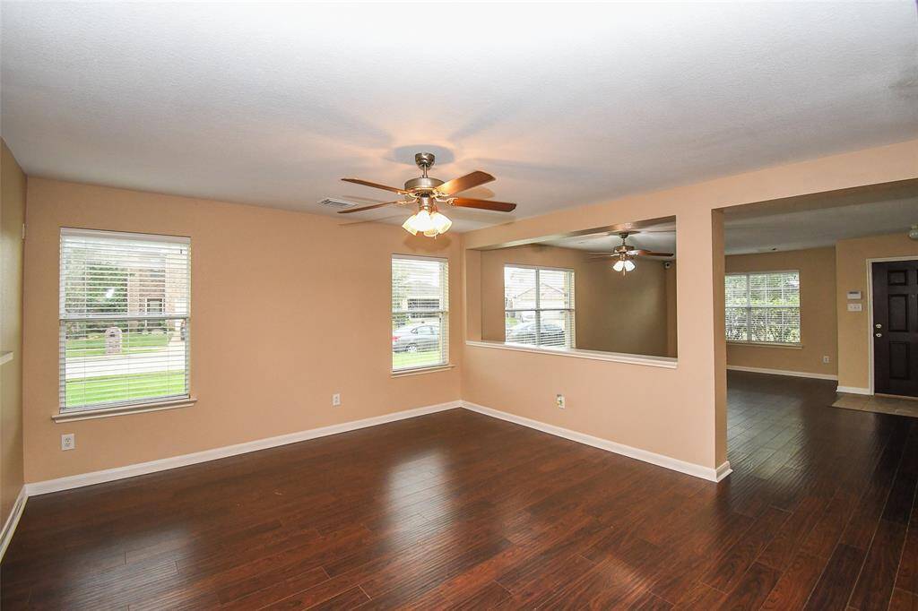 Lots of windows fill the common areas with natural light.  2" faux wood blinds can be found throughout the home.