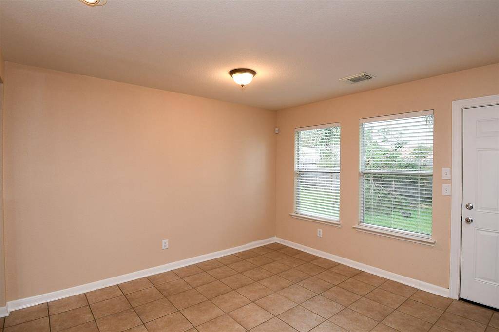 Eat in Kitchen overlooks the back yard.