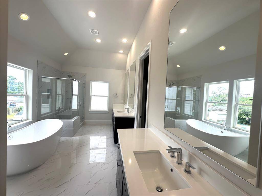 Fantastic Primary Bathroom - Separate Vanities, one w/ a knee space.  Hans Grohe Plumbing Fixtures