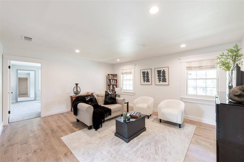 The upstairs versatile game room with plenty of space.