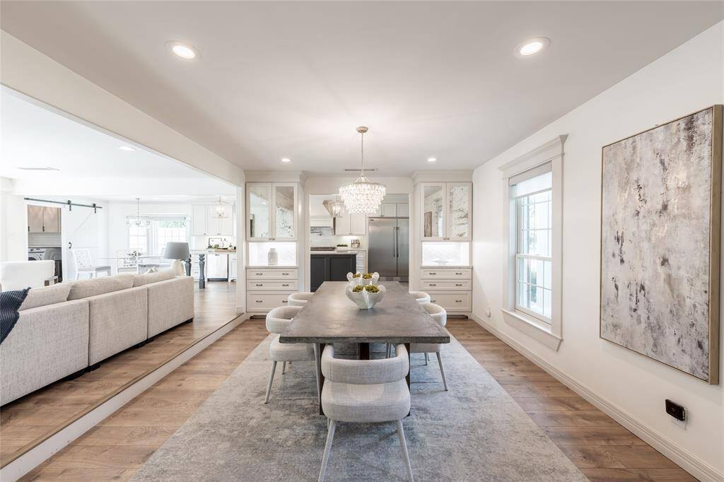 The dining room, measuring 20x13, is perfectly located with easy access to kitchen and living room. Beautiful built-ins for extra storage.