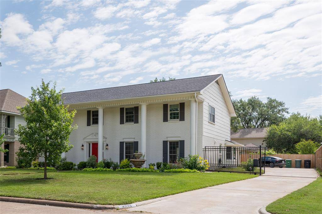 Don't miss out on this beautiful colonial style home that sits on an 8,800 sq ft lot.
