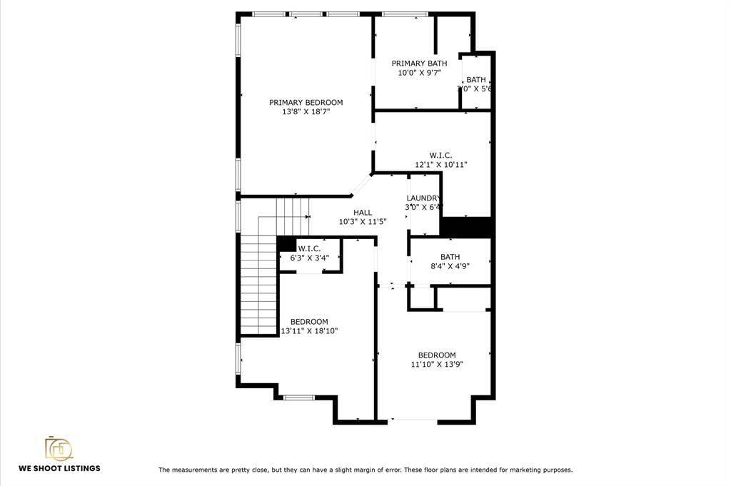 This floor plan showcases the upper level of a home with a spacious primary bedroom and en-suite bath, two additional bedrooms, a second full bathroom, a walk-in closet, and a convenient laundry area. There's also a hall providing access to all rooms.