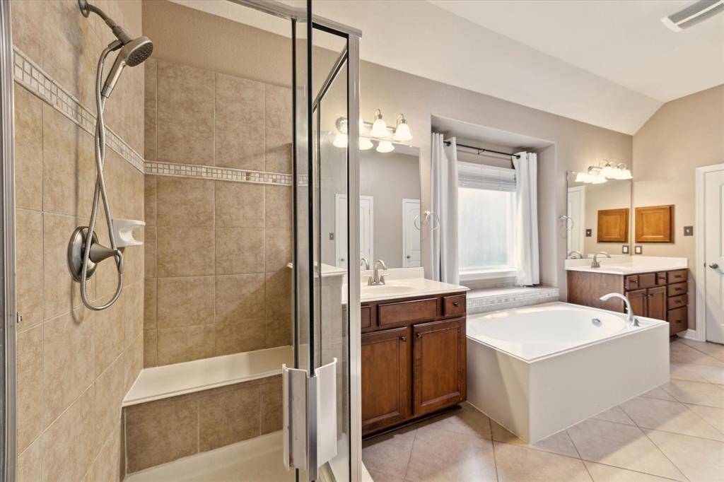 A serene space designed for comfort and convenience. Large his and her closets.