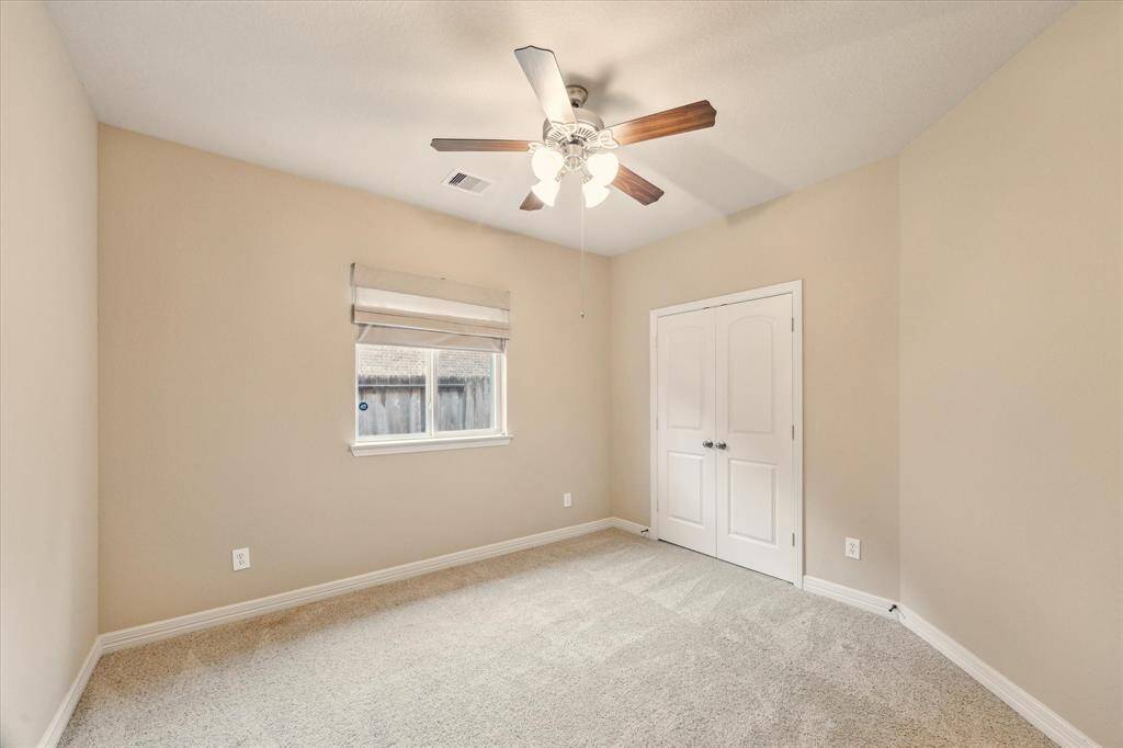 This 4th bedroom is a great option for a guest suite, nursery, or creative workspace.
