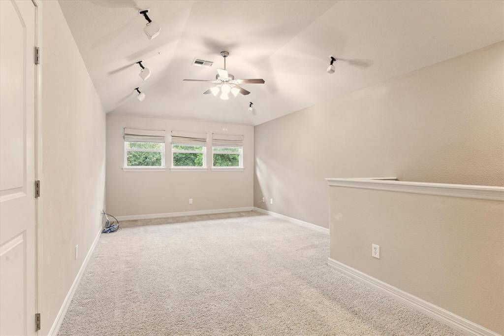 Versatile and spacious, this upstairs bonus room offers endless possibilities — perfect for a media room, playroom, home gym, or guest retreat.