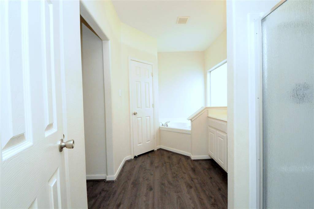 Primary bath, separate shower and soaking tub