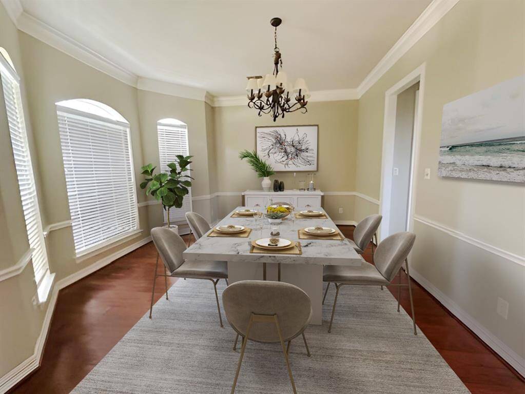 This photo has been virtually staged to show how furniture can be arranged in the space