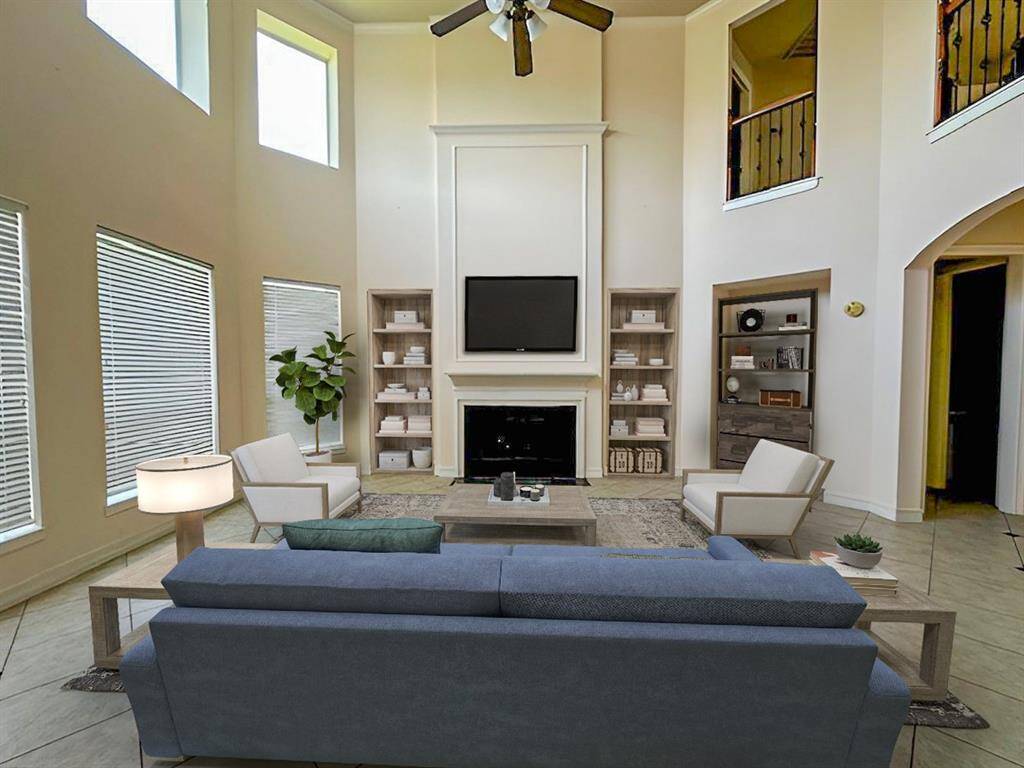 This photo has been virtually staged to show how furniture can be arranged in the space