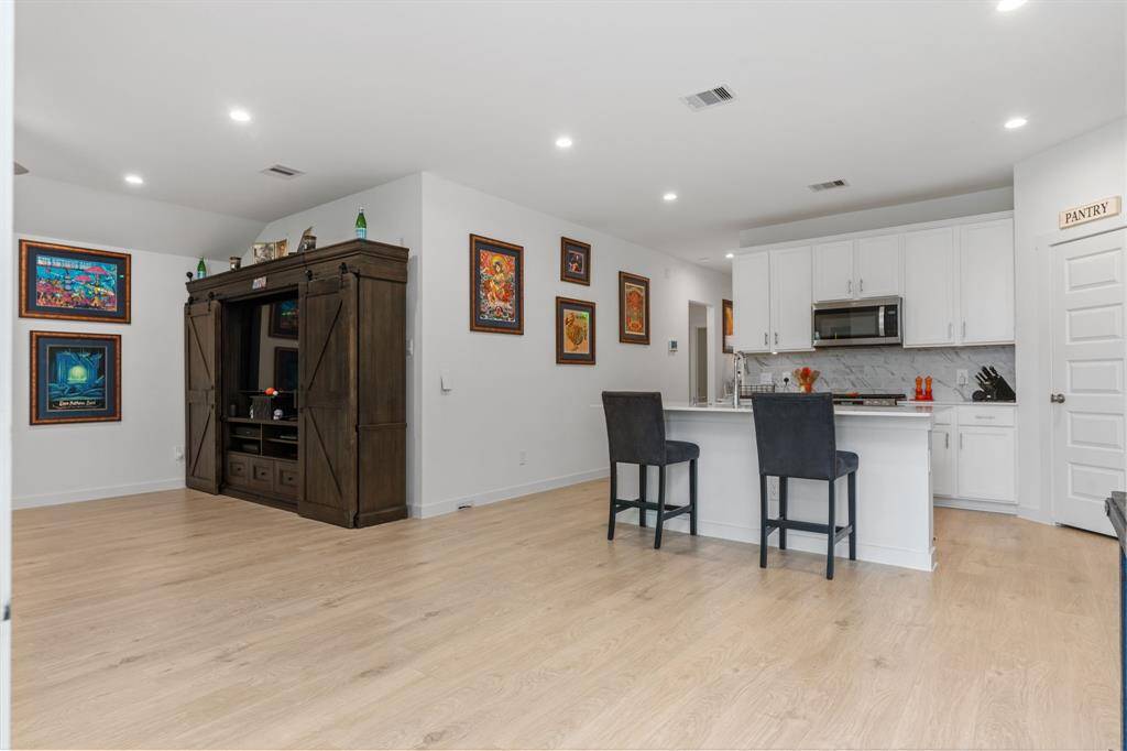 Open concept - living, kitchen and dining room