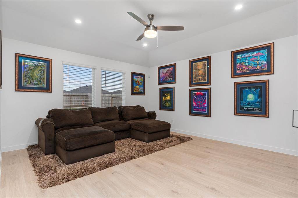 Bright and open living room with big windows.