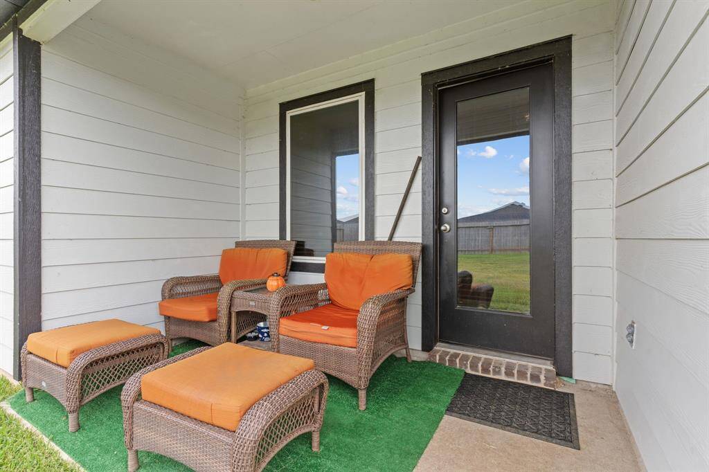 Covered patio off the back entrance.