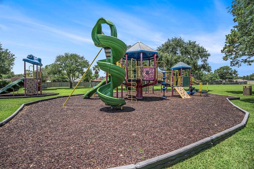 The community park offers a fun and colorful playground with plenty of open green space—perfect for to play, explore, and enjoy the outdoors.