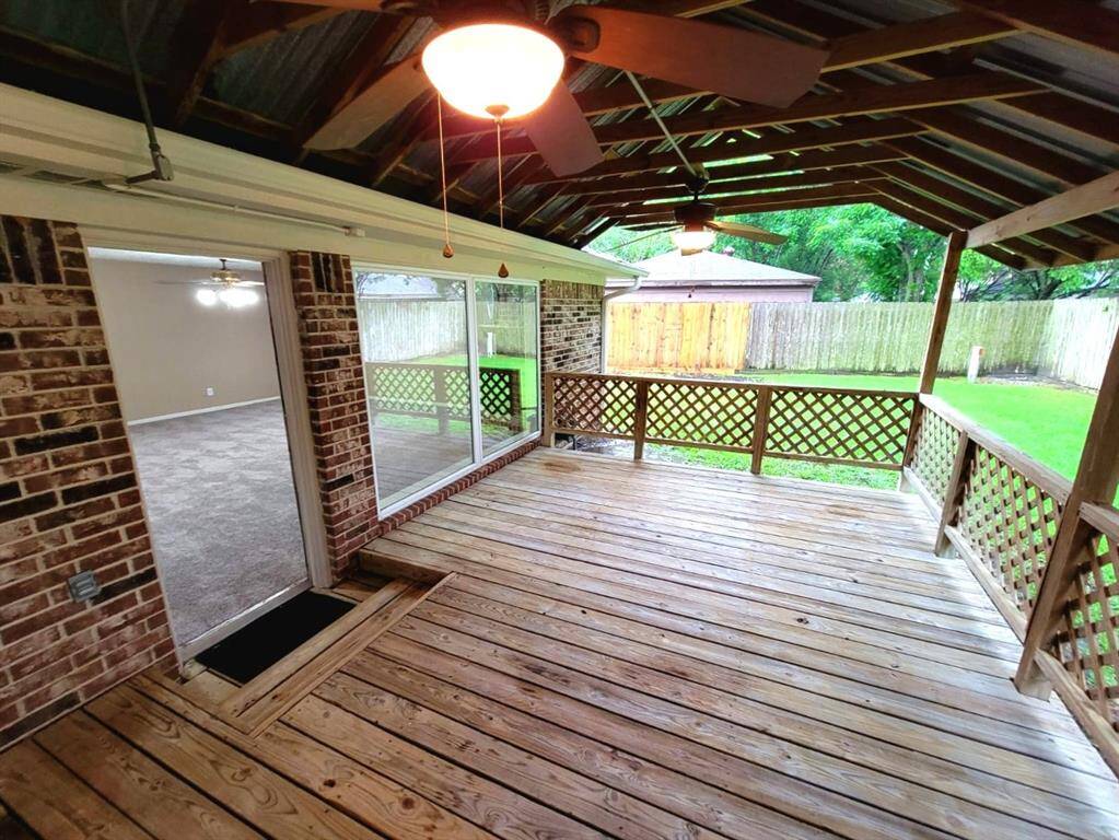 Back Patio with covered deck and ceiling fans