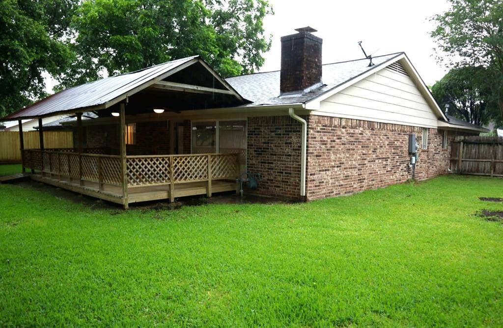 Back Patio with covered deck and ceiling fans