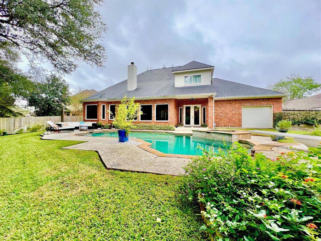 Enjoy this refreshing pool and backyard with no back neighbors!