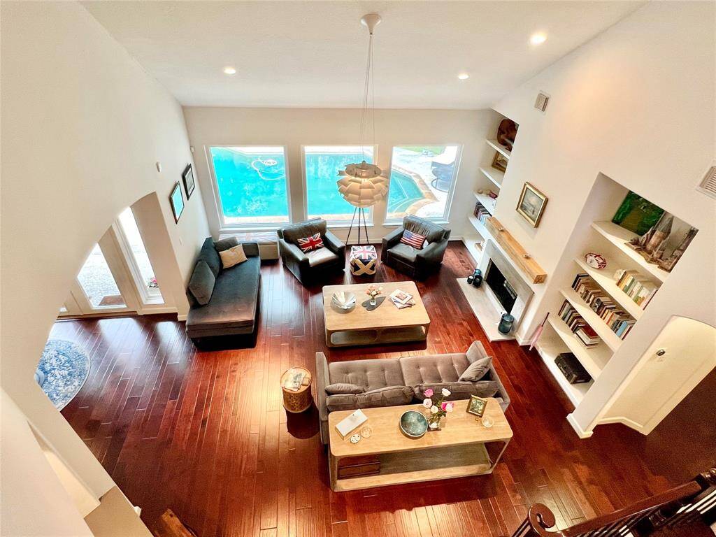 The living room offers a great view of the backyard.