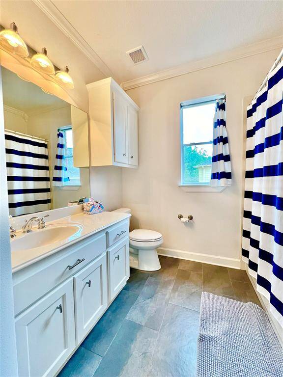 The secondary full bathroom upstairs.