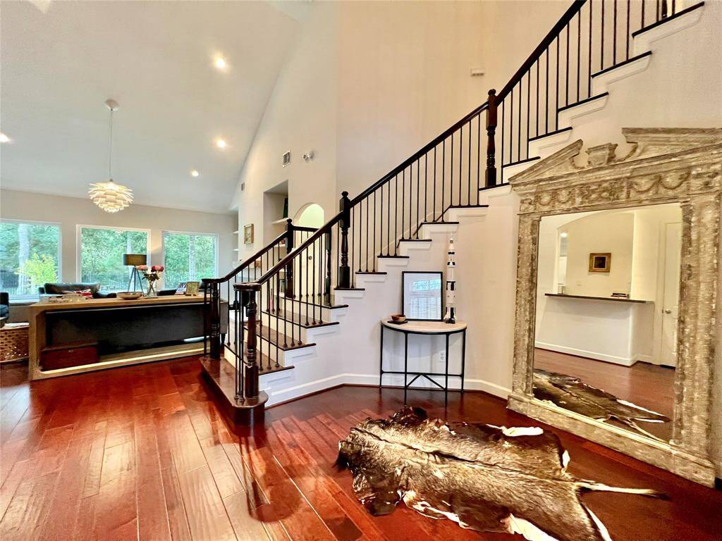 A continuation of the beautiful entry. This is a perfect place for a Christmas tree or nice furniture.