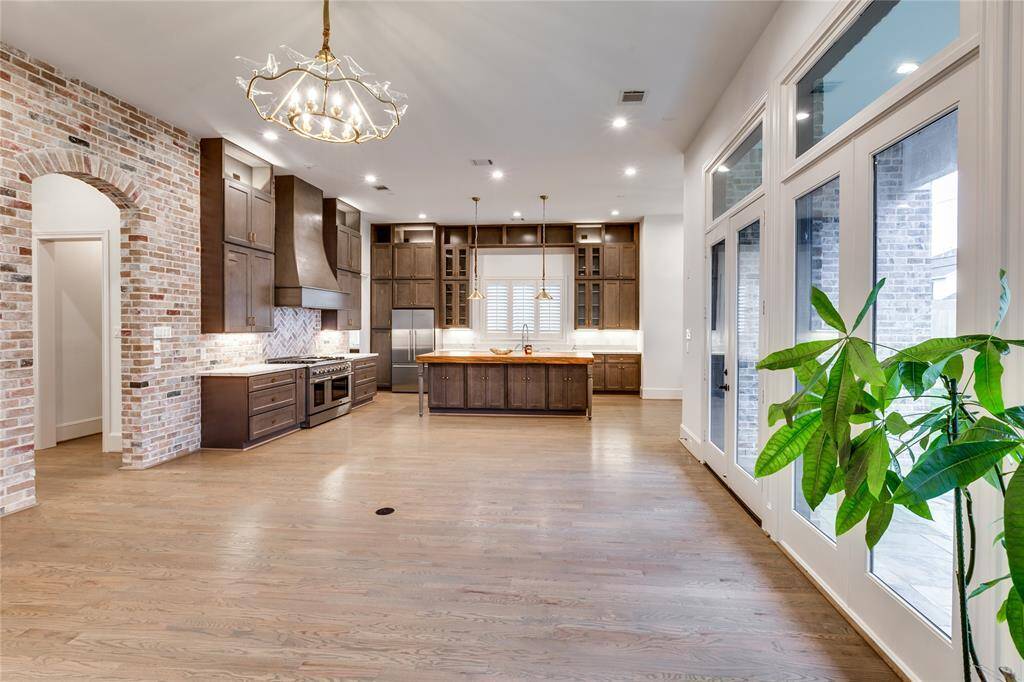 Notice the brick wall and 100% brass lighting fixture