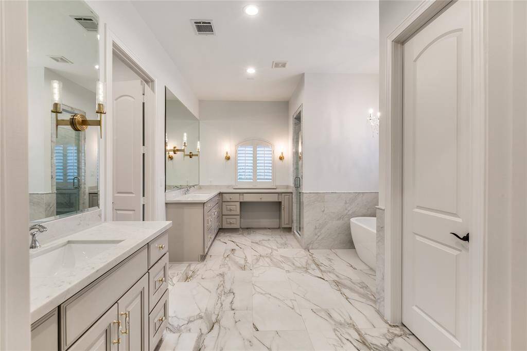 Master bathroom with free standing soak tub and double vanity