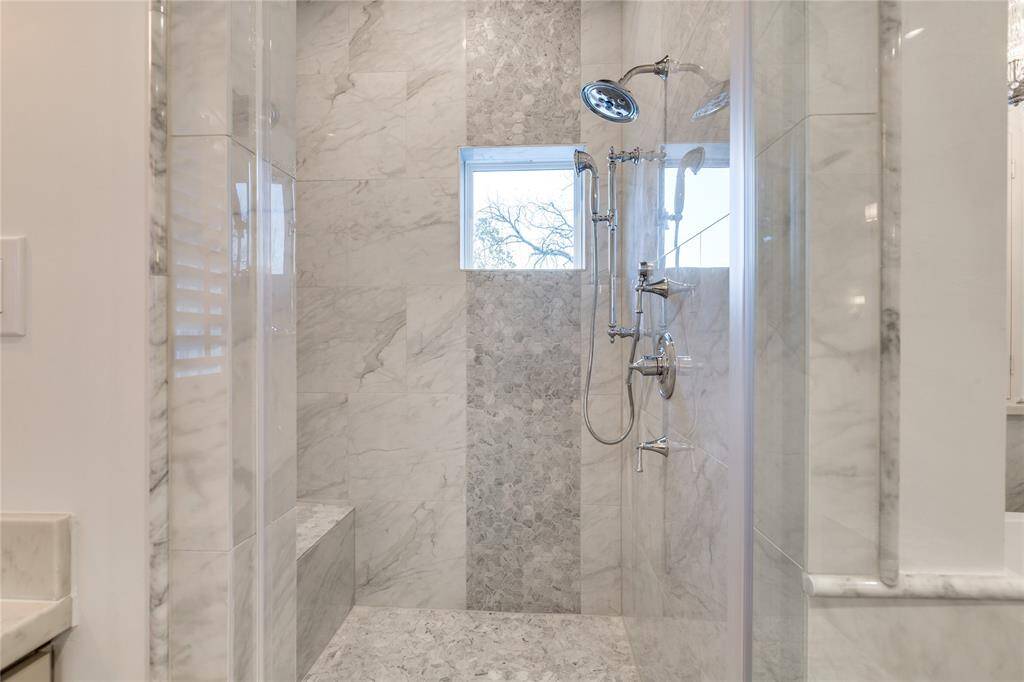 Master bathroom with free standing soak tub and separate shower room